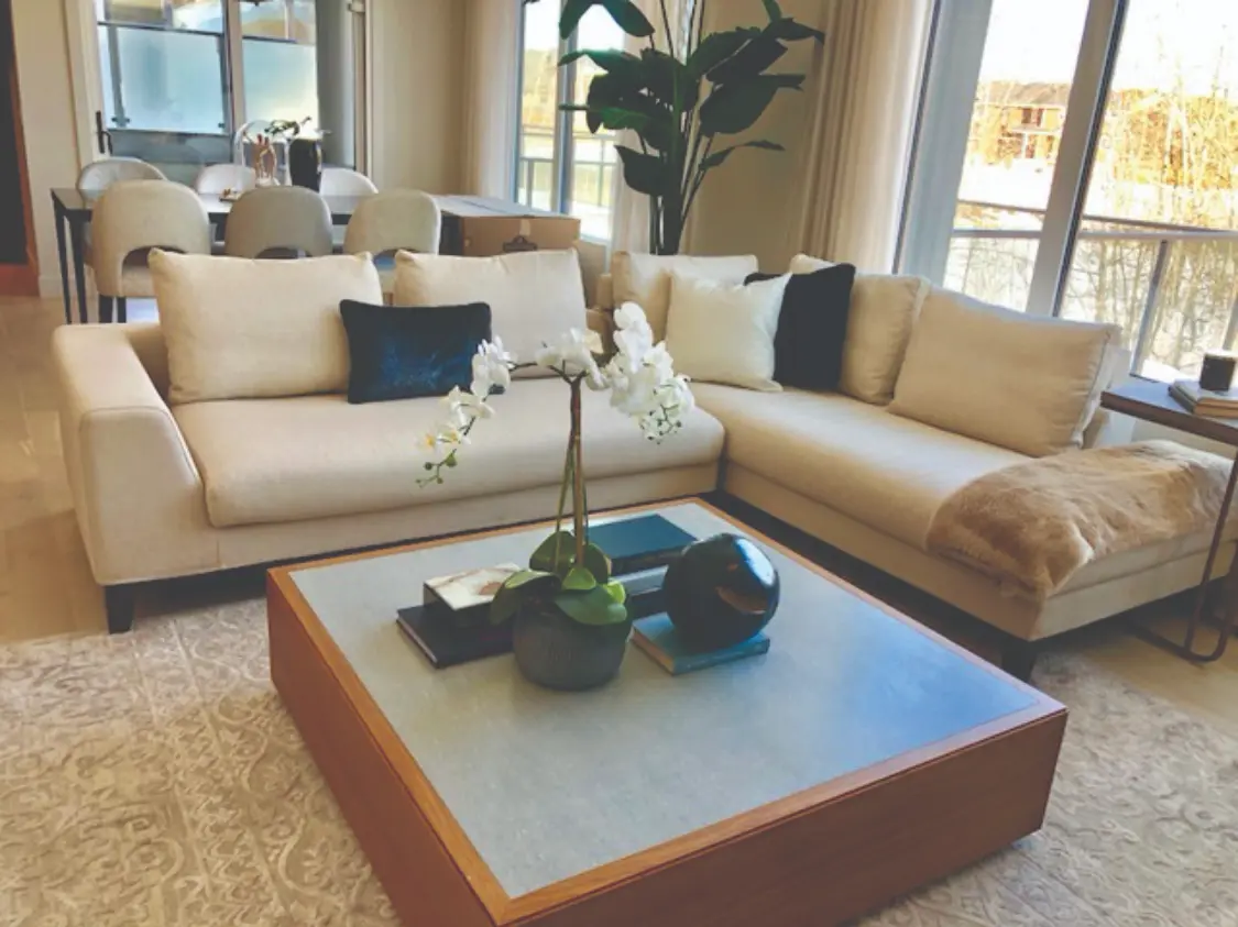 Staged living room with elegant furniture arrangements for Restage's builder and realtor loyalty program.