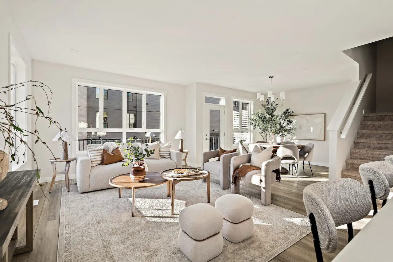 Luxury home staging in Calgary by Restage, featuring a modern living room and open-concept dining area.