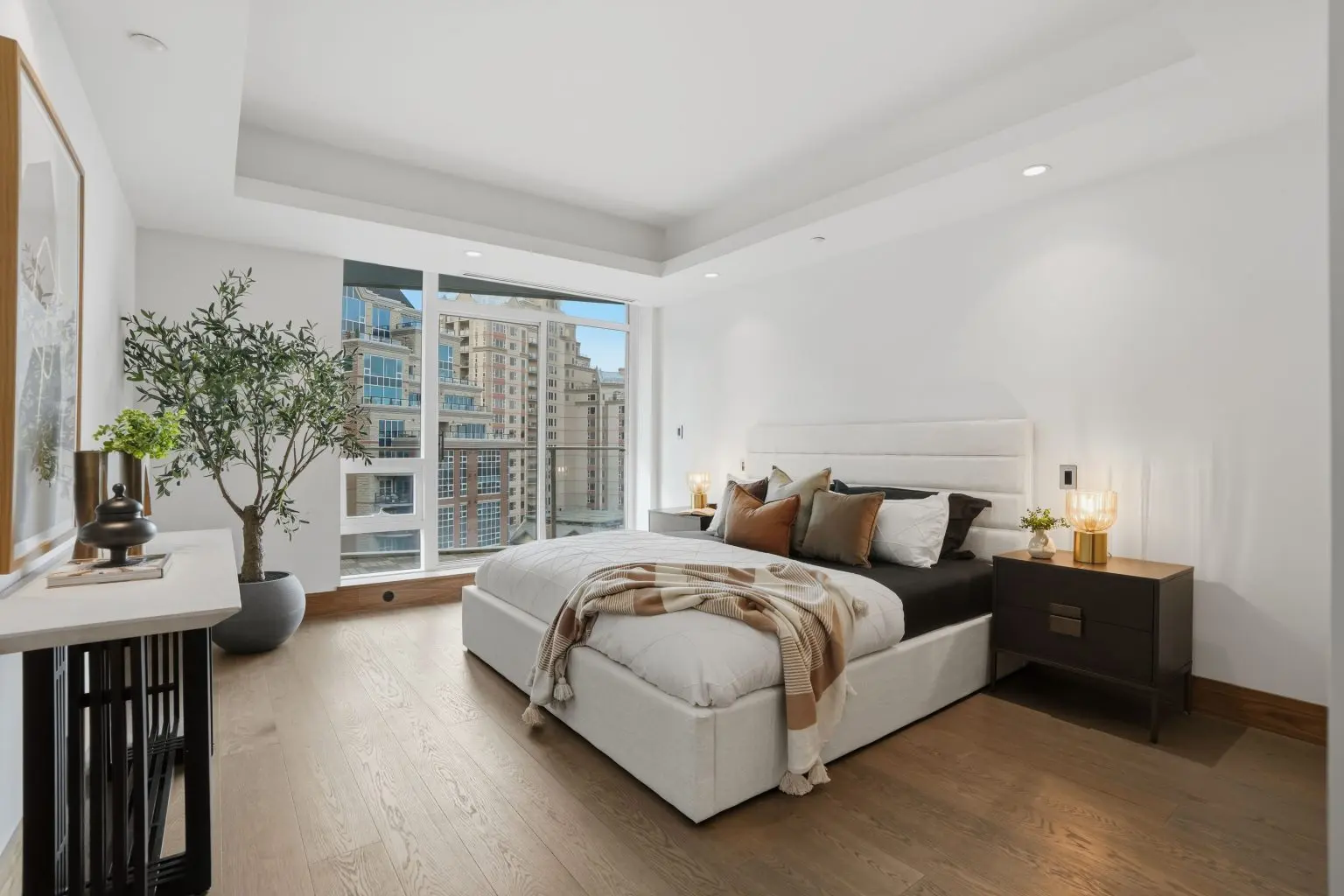 Best home builder staging Calgary bedroom professionally furnished and styled