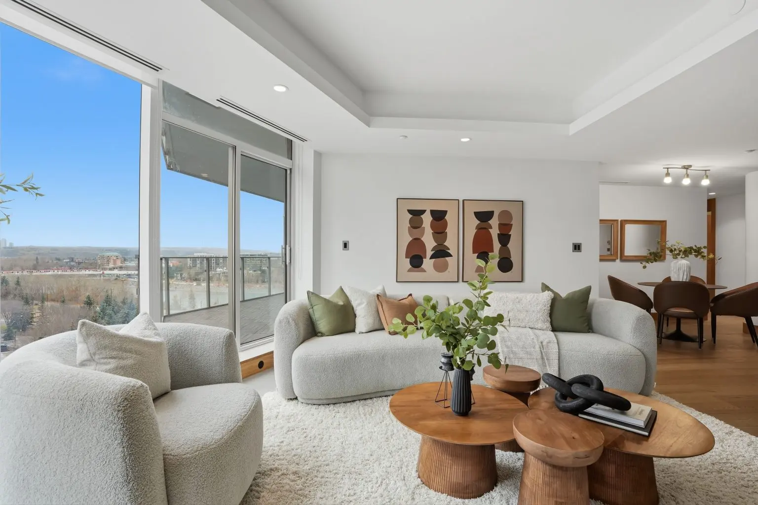 Expert home builder staging Calgary living area with coordinated furniture and décor