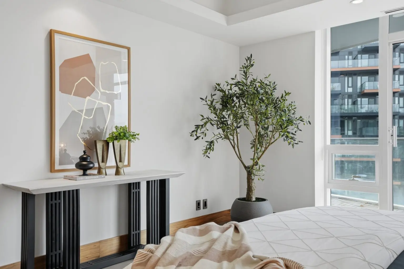 Home builder show home staging Calgary with coordinated furniture and interior styling
