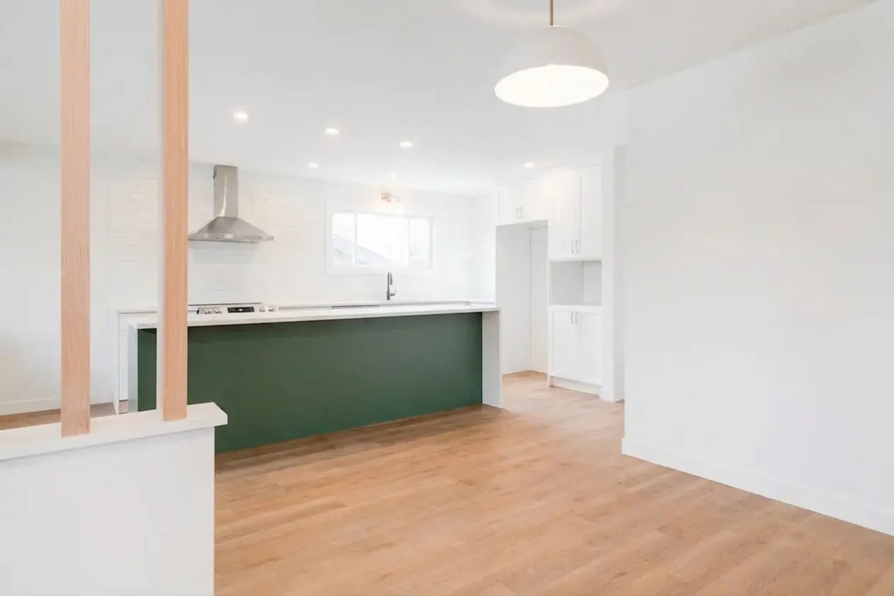 Before staging in a modern Calgary kitchen and living room