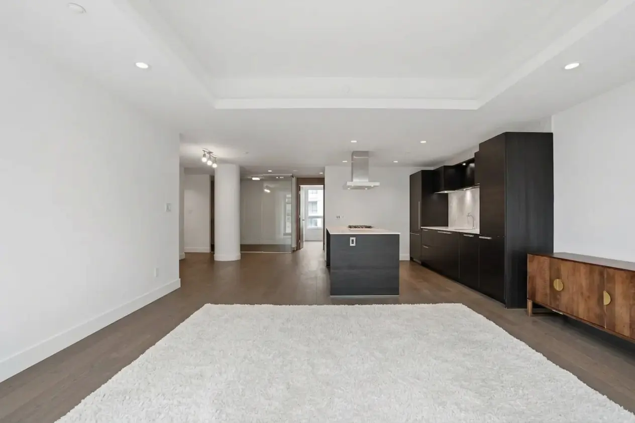 Before staging in a modern Calgary kitchen and living area
