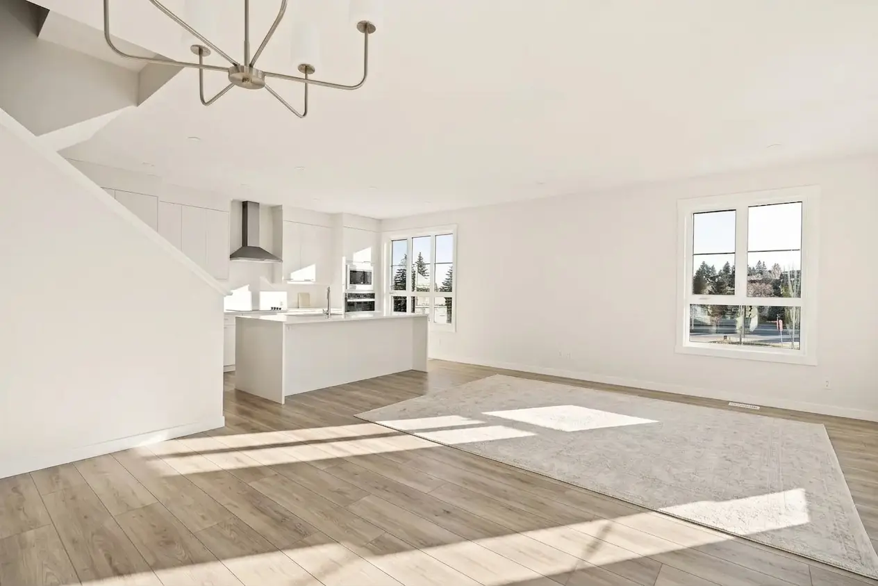 Before home staging in an open-concept Calgary living and kitchen area